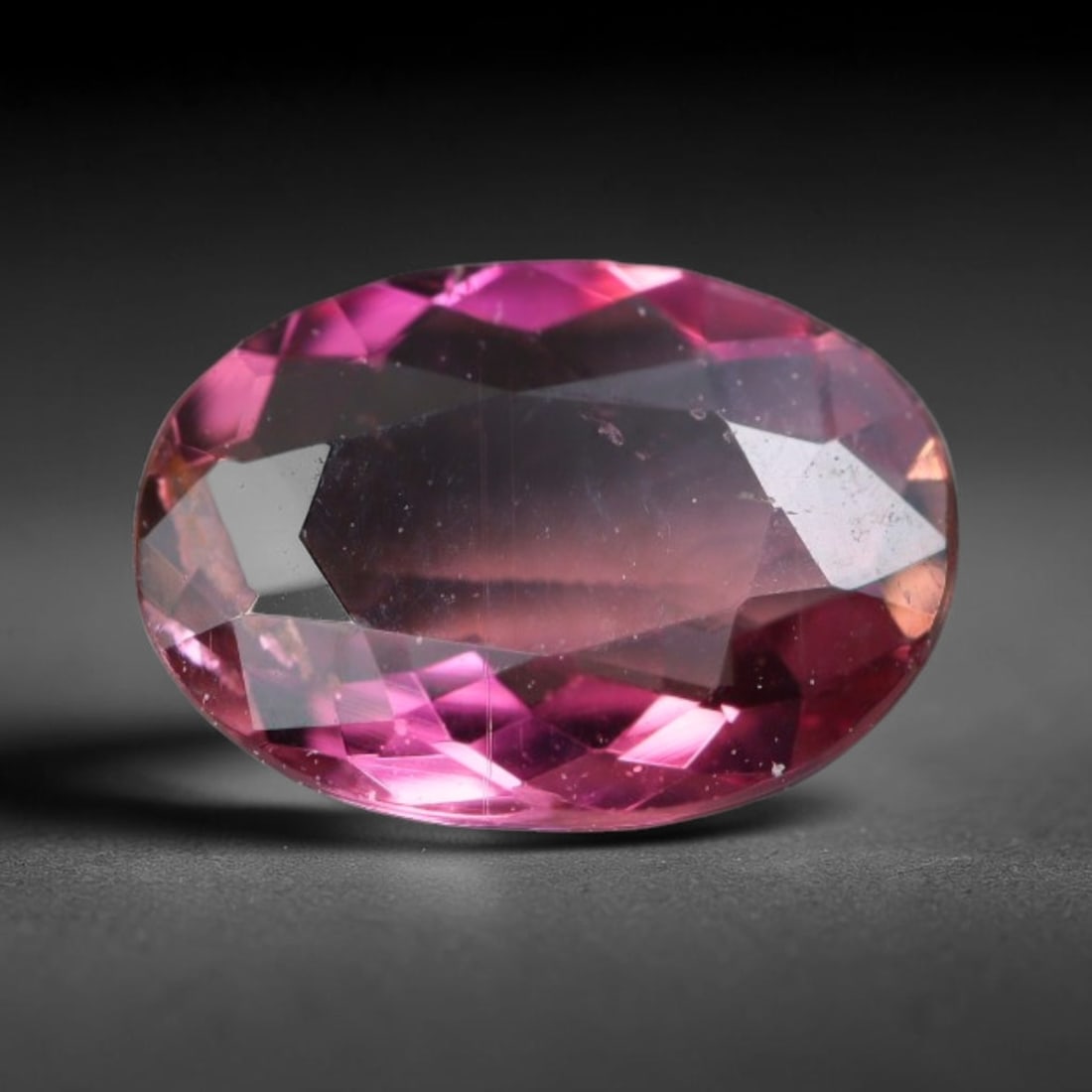 0.84 Carats Natural Bi-Color Pink Orange Tourmaline Oval Faceted Loose Gemstone, 53WS: This elegant oval faceted tourmaline features stunning bi-color gradient of vivid pink and warm orange glowing through crisp polished facets, with tiny subtle natural mineral specks scattered within i