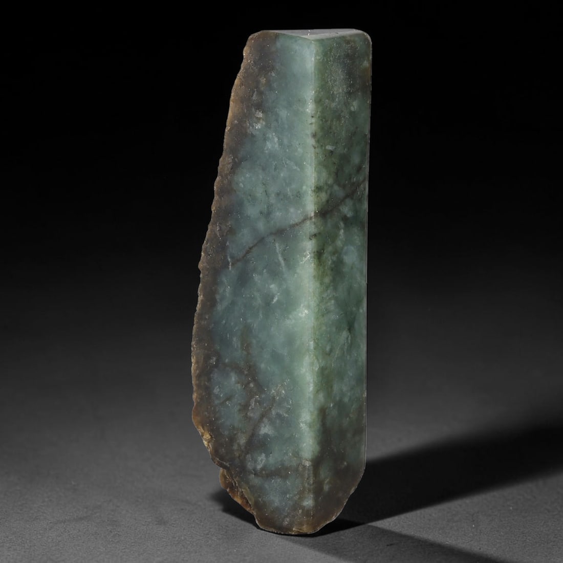 245ct Natural Type A Burmese Jadeite Jade Sliced Rough, 17YK: This specimen is a sliced rough block of natural Type A Burmese jadeite jade. The interior displays natural colour zoning with visible mineral veining and crystalline patterns typical of unprocessed j