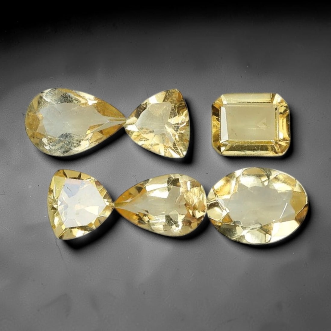3.49 Carats Natural Pale Golden Citrine Mixed Cut Parcel Lot, 11XZ: Let me share with you this really nice parcel of six natural citrine faceted stones with soft honey-gold coloring all around. This whole group weighs a total of 3.49 carats, with individual sizes aver