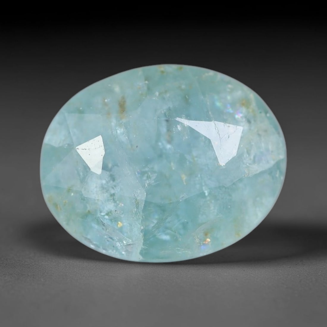 1.68 Carats Natural Soft Sky Blue Oval Faceted Tourmaline Loose Gemstone, 95YG: Natural translucent pale sky blue tourmaline precisely oval faceted loose gemstone, multi-brilliant cut delivers soft diffused light sparkle, showcasing a serene icy aqua-blue tone throughout the crys