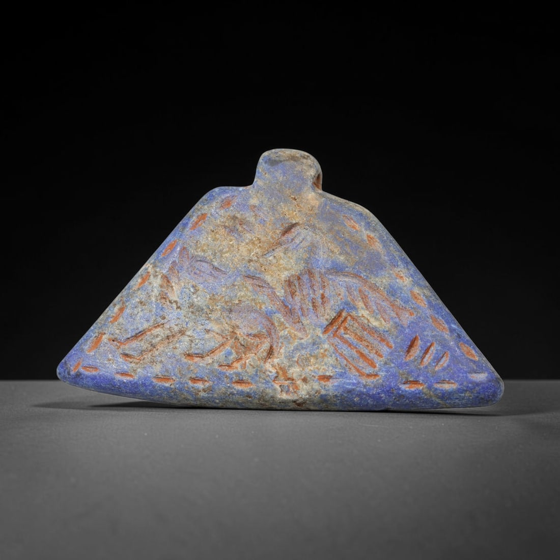 Ancient Sasanian Lapis Lazuli Hand Carved Amulet, 30WT: Antique wearable protective amulet fully carved from solid natural lapis lazuli stone, originating from the historic Sasanian Empire cultural sphere. Lapis lazuli was an immensely valued sacred stone 