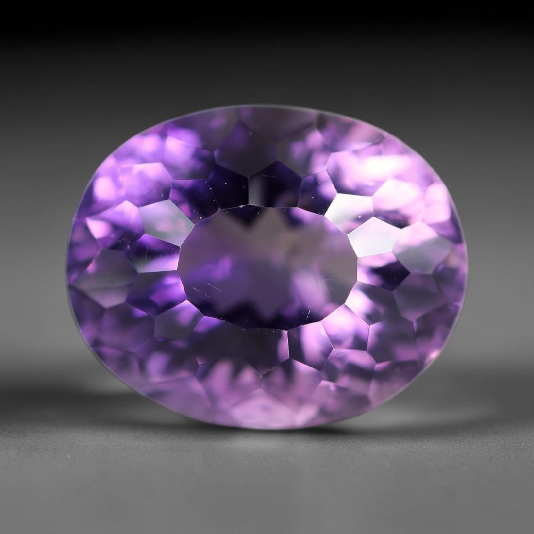 14.27 Carats Natural Brazilian Amethyst Loose Gemstone, 19WP: This natural Brazilian amethyst holds dimension readings of 16.9x13.7x11mm, a transparent crystalline quartz specimen sourced from Brazil's well-documented amethyst mineral formations that consistentl