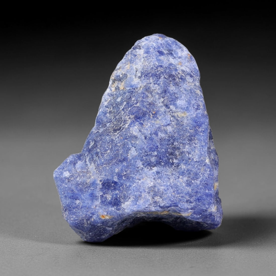 62.51 Carats Natural Royal Blue Sodalite Rough Stone, 26ZQ: This genuine natural sodalite rough exhibits soft blended royal blue mineral coloration mixed with pale crystalline matrix formed through natural igneous geological formation. Fine light mineral speck