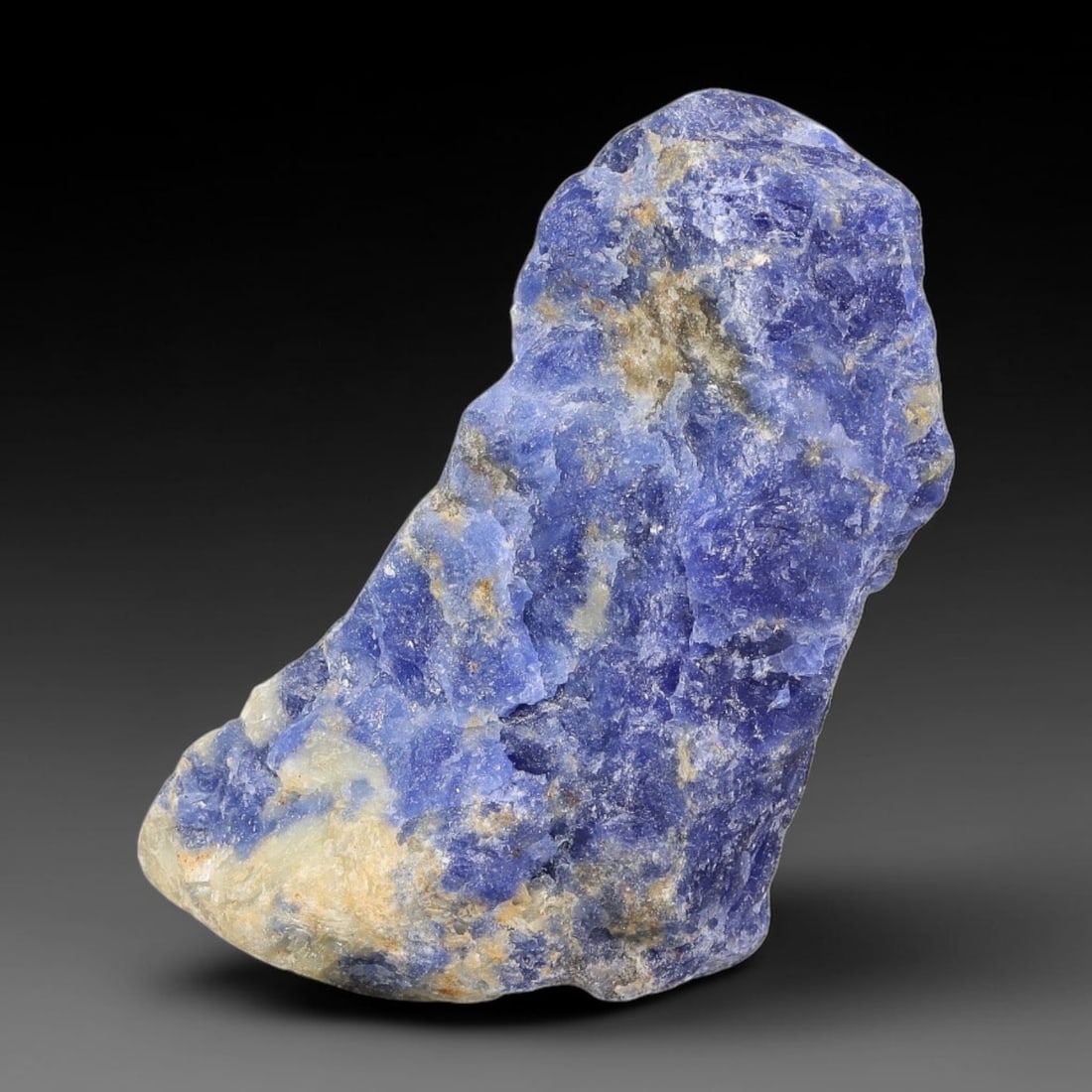 93.28 Carats Natural Royal Blue Sodalite Rough Stone, 86YR: This genuine natural sodalite rough exhibits soft blended royal blue mineral coloration mixed with pale crystalline matrix formed through natural igneous geological formation. Fine light mineral speck