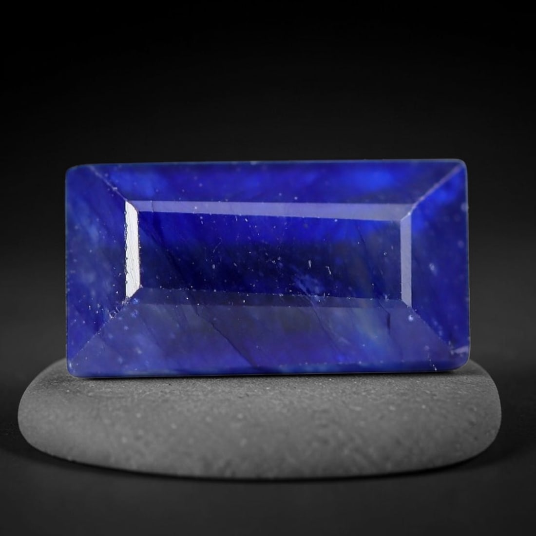 3.13 Carats Royal Blue Sapphire Emerald Cut Loose Gemstone, 8WJ: This sharp emerald rectangular faceted sapphire features an intense deep royal blue hue, brought to vivid life by crisp step-cut facets. Natural fine fissures and scattered tiny mineral micro-inclusio