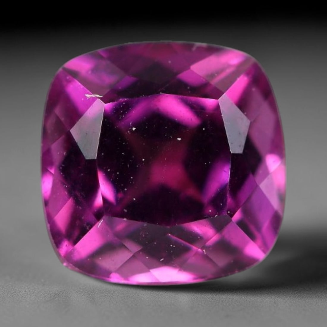 1.40 Carats Natural Rhodolite Garnet Loose Gemstone, 53WJ: This genuine natural rhodolite garnet presents rich pink-purple coloration formed through natural geological mineral development. Fine microscopic mineral flecks and subtle internal textural details n