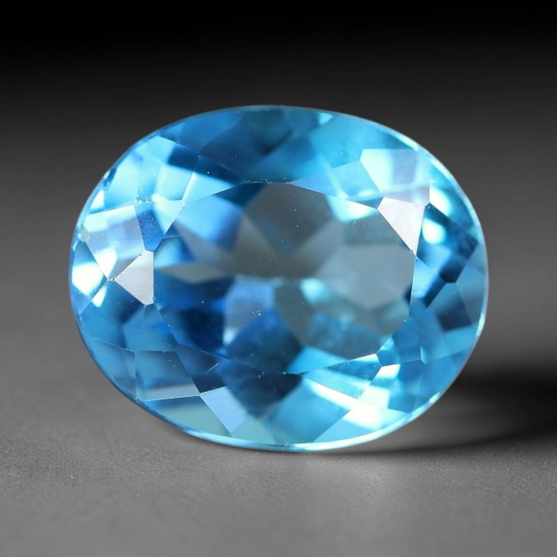 4.39 Carats Natural Swiss Blue Topaz Loose Gemstone, 98WJ: This genuine natural swiss blue topaz displays consistent saturated blue coloration inherent to unprocessed natural mineral specimens. Formed through natural geological formation, the stone carries su