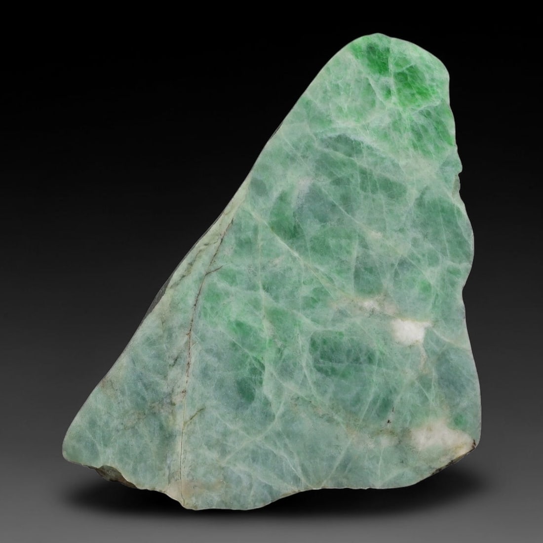175ct Natural Type A Burmese Jadeite Jade Sliced Rough, 9YN: This specimen is a sliced rough block of natural Type A Burmese jadeite jade. The interior displays natural colour zoning with visible mineral veining and crystalline patterns typical of unprocessed j