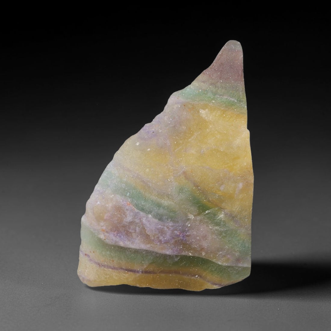 95.95 Carats Natural Rainbow Banded Fluorite Raw Rough Chunk, 98YR: This genuine natural fluorite rough features stunning curved layered bands of green, golden yellow and soft lavender-purple formed through natural hydrothermal crystal growth. One side retains raw unp