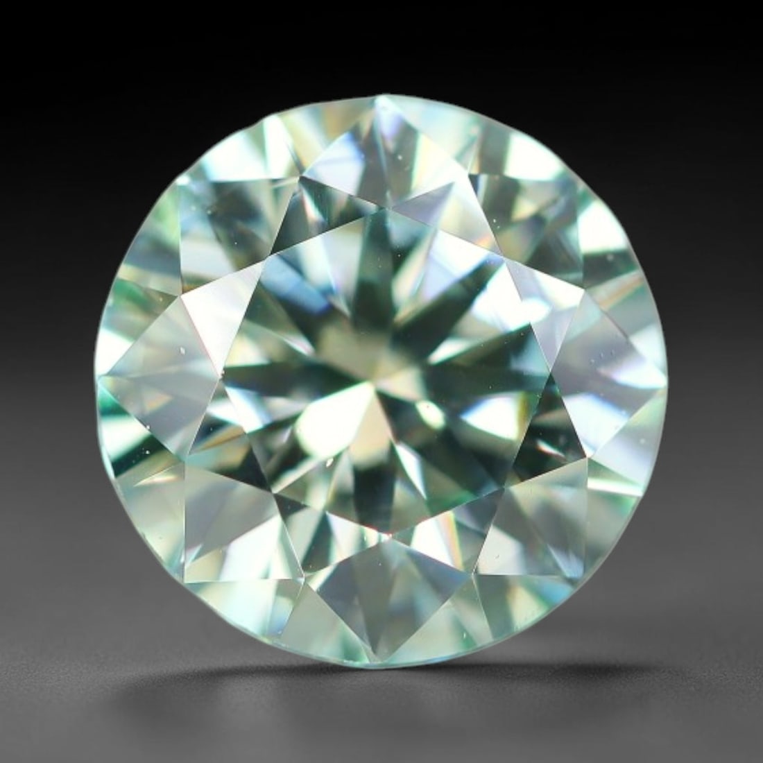 0.97 Carats Aqua Toned Moissanite Loose Gemstone, 60WP: This moissanite features dimensional measurements of 6.4x4mm, lab-grown silicon carbide material valued for superior light refraction that delivers vivid multi-hued sparkle across all lighting conditi