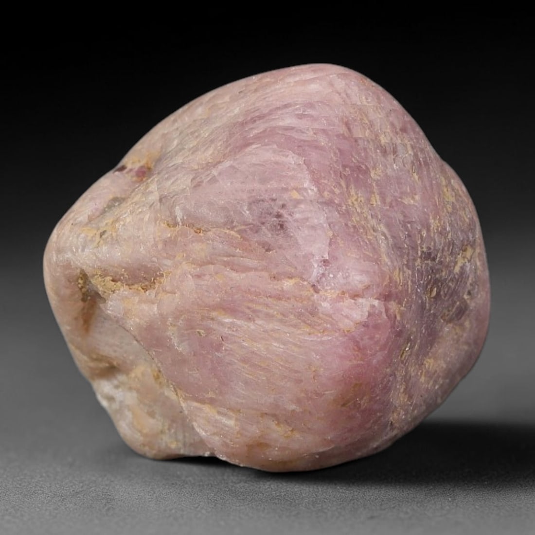 27ct Natural Unheated Sri Lankan Purplish Blue Sapphire Rough, 54YQ: This natural corundum rough is an unheated purplish blue sapphire sourced from Sri Lankan alluvial gem deposits, featuring an irregular natural native form with residual pale yellow-brown mineral matr