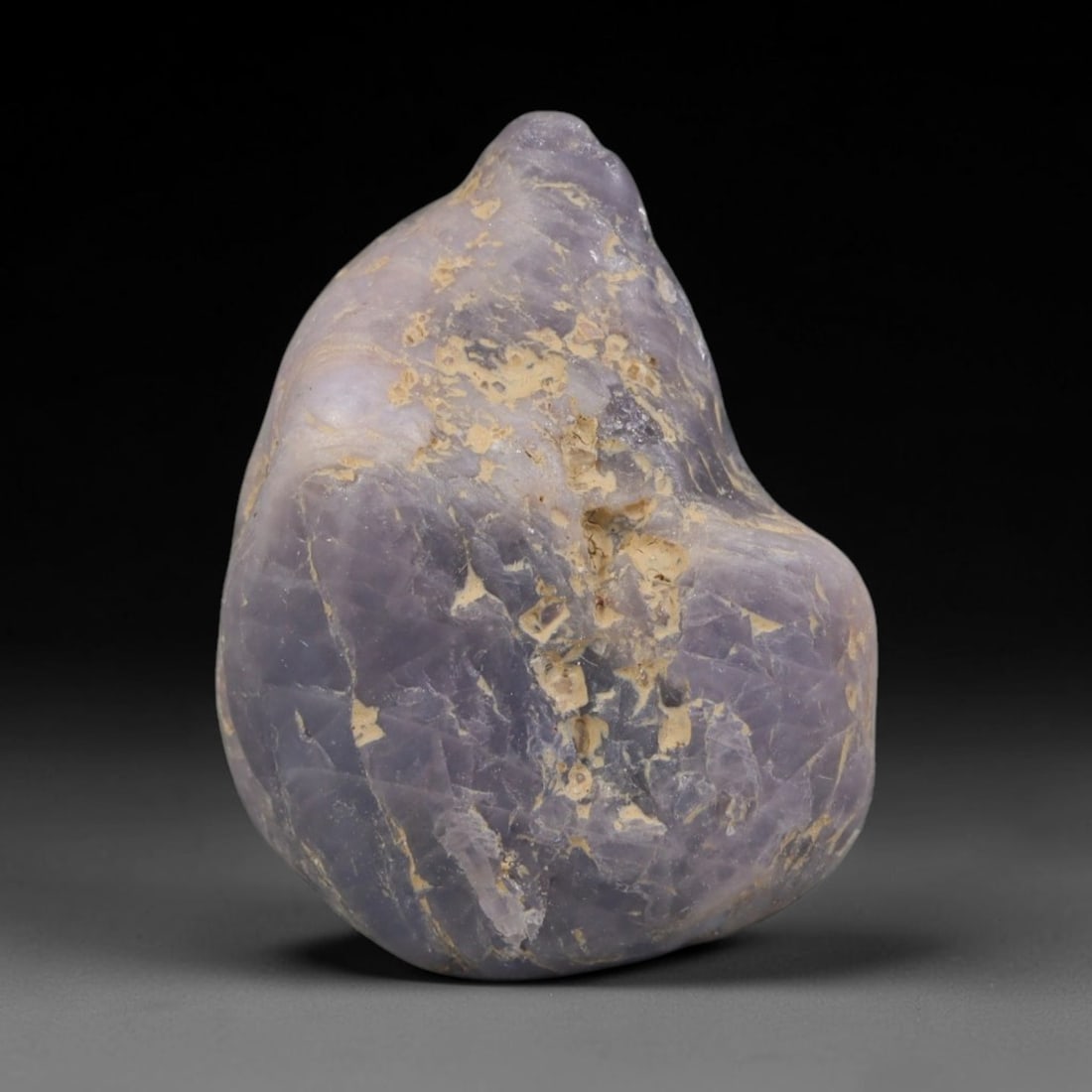 60ct Natural Unheated Sri Lankan Purplish Blue Sapphire Rough, 84YQ: This natural corundum rough is an unheated purplish blue sapphire sourced from Sri Lankan alluvial gem deposits, featuring an irregular natural native form with residual pale yellow-brown mineral matr