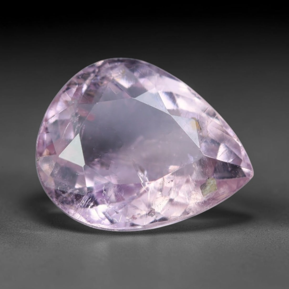 2.58 Carats Natural Lavender Pink Tourmaline Pear Faceted Loose Gemstone, 56WS: This graceful pear faceted tourmaline boasts soft lavender pink tone shimmering through precisely polished facets, with natural fine internal veils and tiny mineral crystal inclusions visible within t