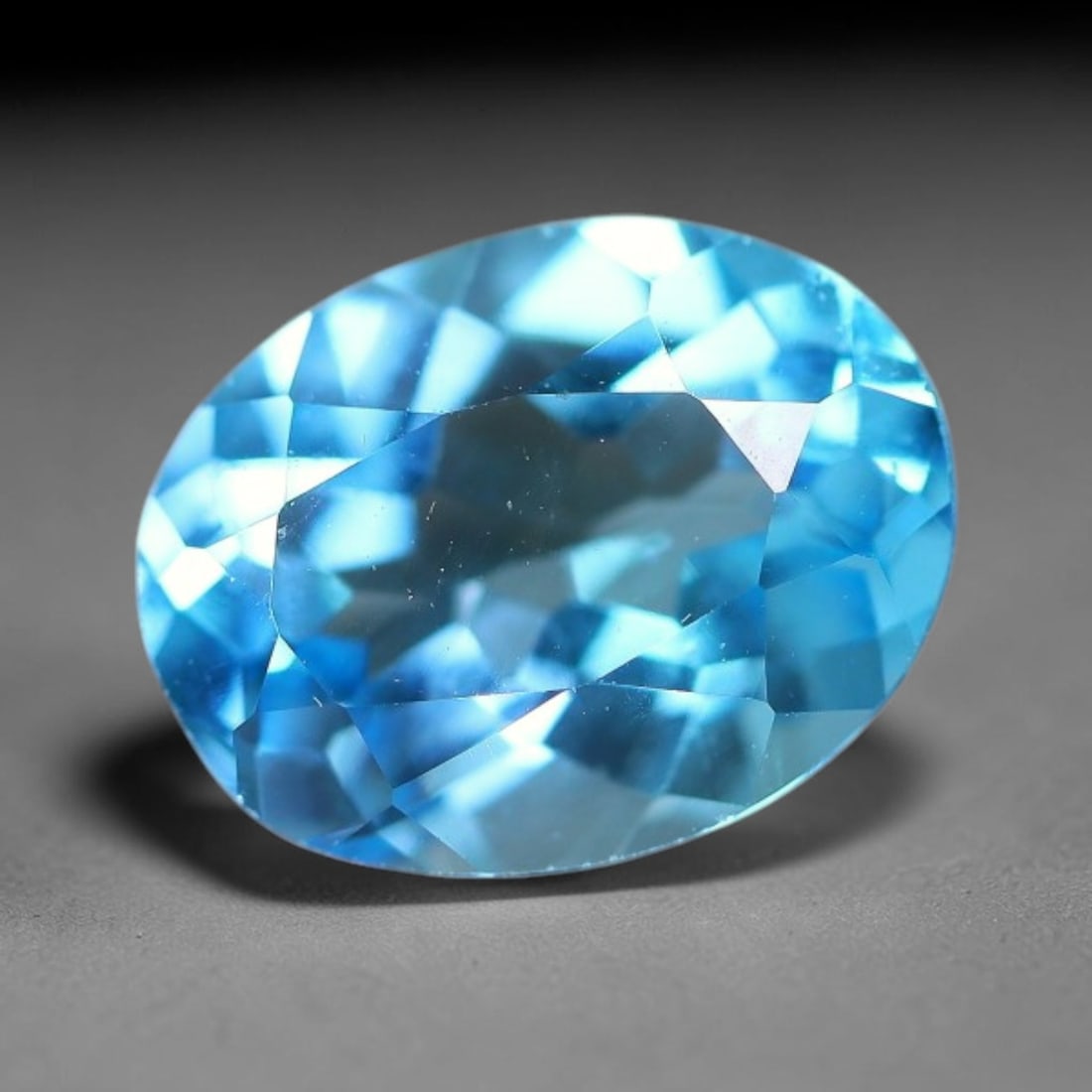 2.70 Carats Natural Swiss Blue Topaz Loose Gemstone, 13WP: This genuine natural swiss blue topaz displays consistent saturated blue coloration inherent to unprocessed natural mineral specimens. Formed through natural geological formation, the stone carries su