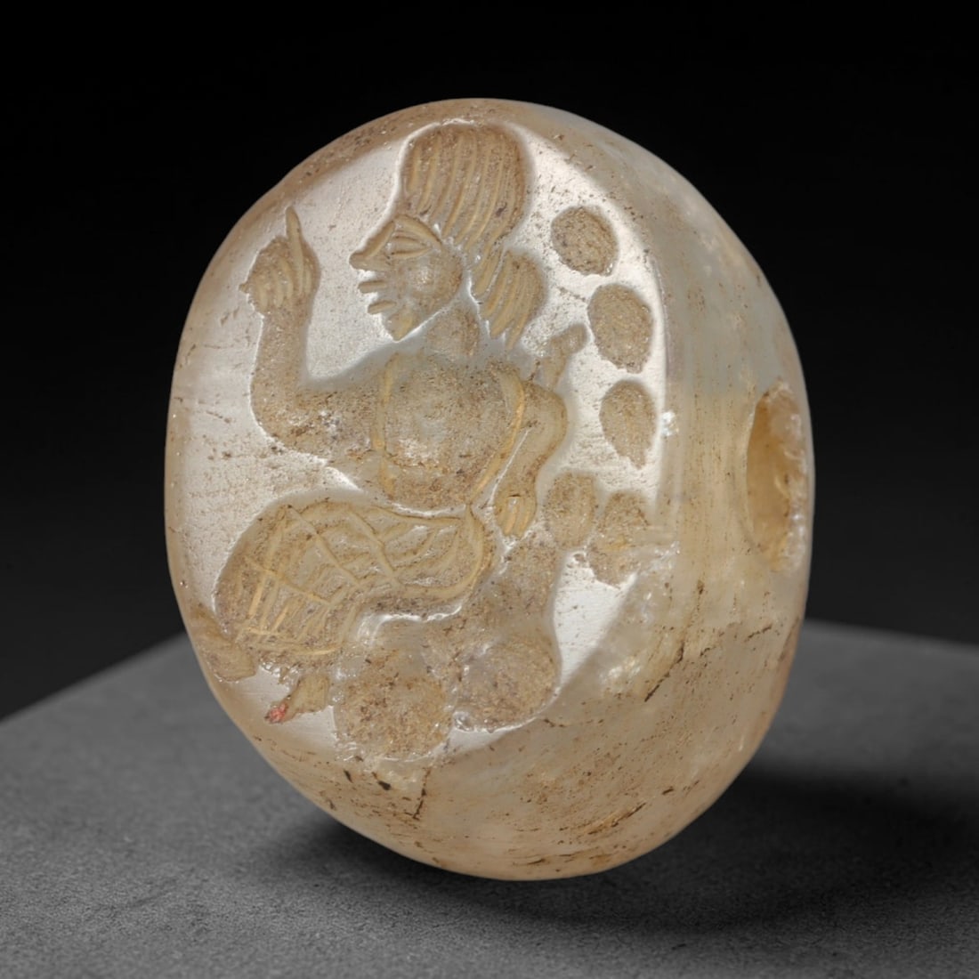 Ancient Sasanian Hand Engraved Rock Crystal Stamp Seal Talisman, 16WT: Miniature antique perforated sealing artifact meticulously carved from natural translucent rock crystal quartz, measuring 2cm x 1.5cm, originating from ancient Sasanian Persian cultural and administra