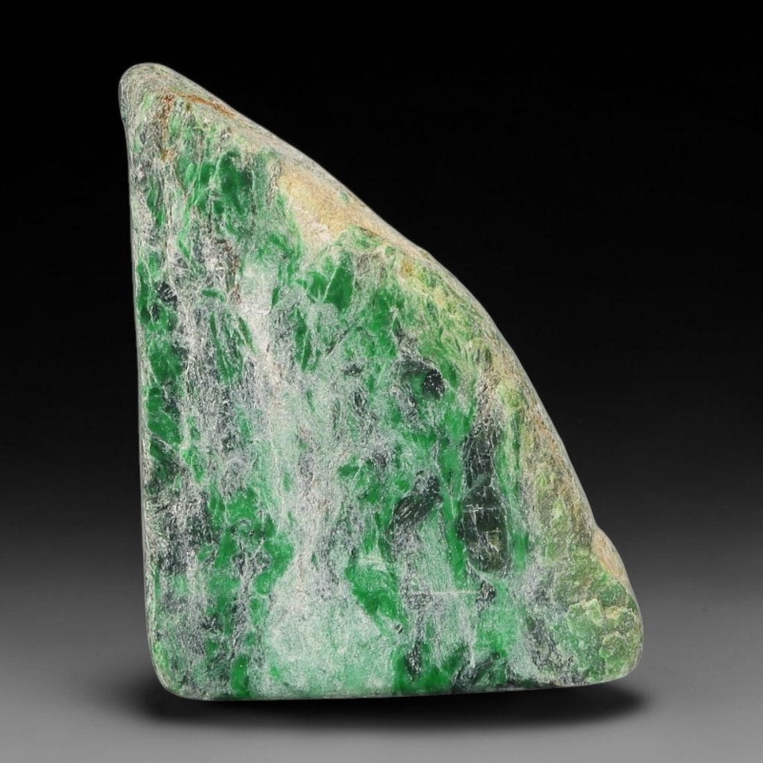 120ct Natural Type A Burmese Jadeite Jade Sliced Rough, 52YK: This specimen is a sliced rough block of natural Type A Burmese jadeite jade. The interior displays natural colour zoning with visible mineral veining and crystalline patterns typical of unprocessed j