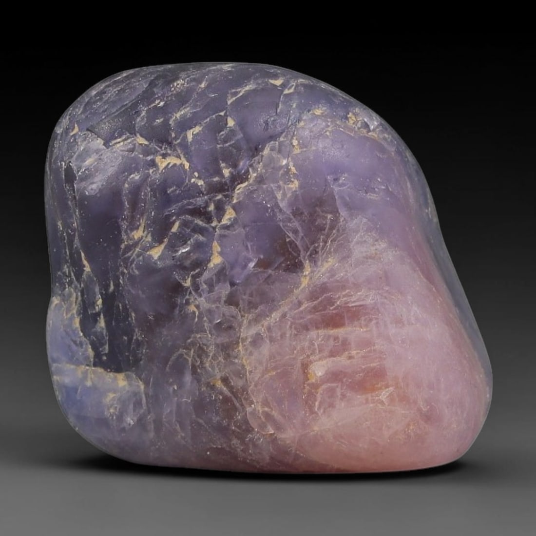 30ct Natural Unheated Sri Lankan Purplish Blue Sapphire Rough, 78YQ: This natural corundum rough is an unheated purplish blue sapphire sourced from Sri Lankan alluvial gem deposits, featuring an irregular natural native form with residual pale yellow-brown mineral matr