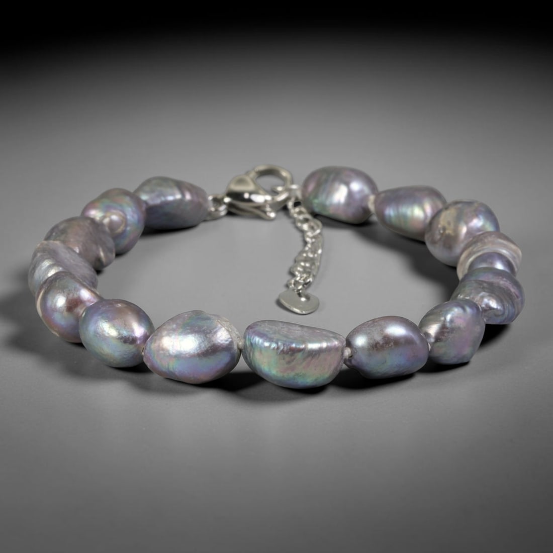 Natural Freshwater Pearl Bracelet - Baroque Dark Peacock Pearl Strand, 88YM: Strung from large organic baroque natural freshwater pearls displaying deep peacock iridescence with shifting violet, teal and bronze overtones, each bead retaining naturally irregular teardrop contou