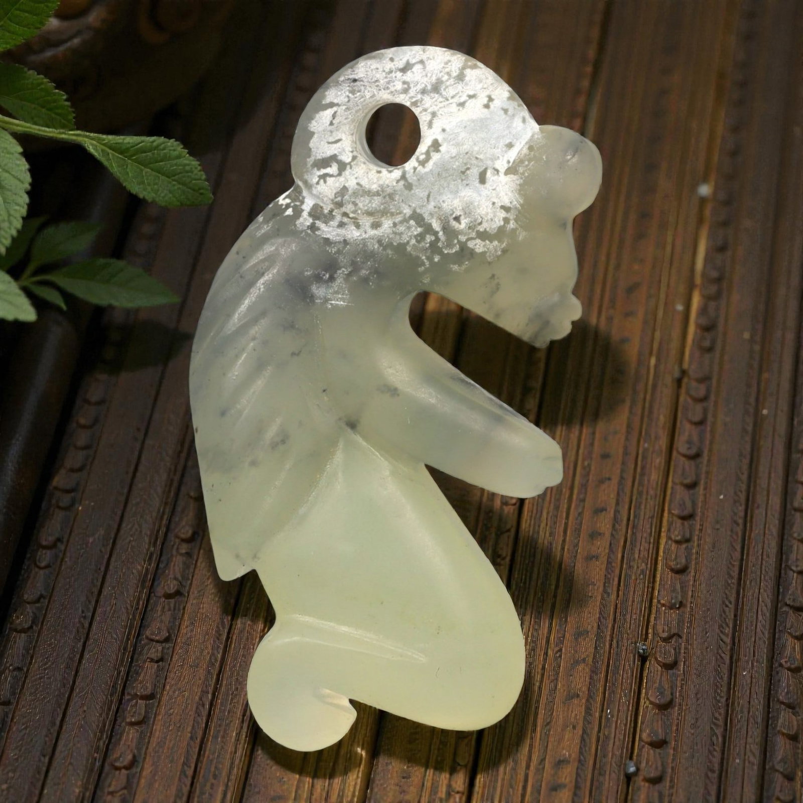 Chinese Jade Anthropomorphic Pendant - Carved Figure 6.7cm, 91ZC: Carved from pale green jade with soft translucency and cloudy natural inclusions, this sculptural figure is rendered in an upright, kneeling posture with arms bent forward. The carving presents a simp