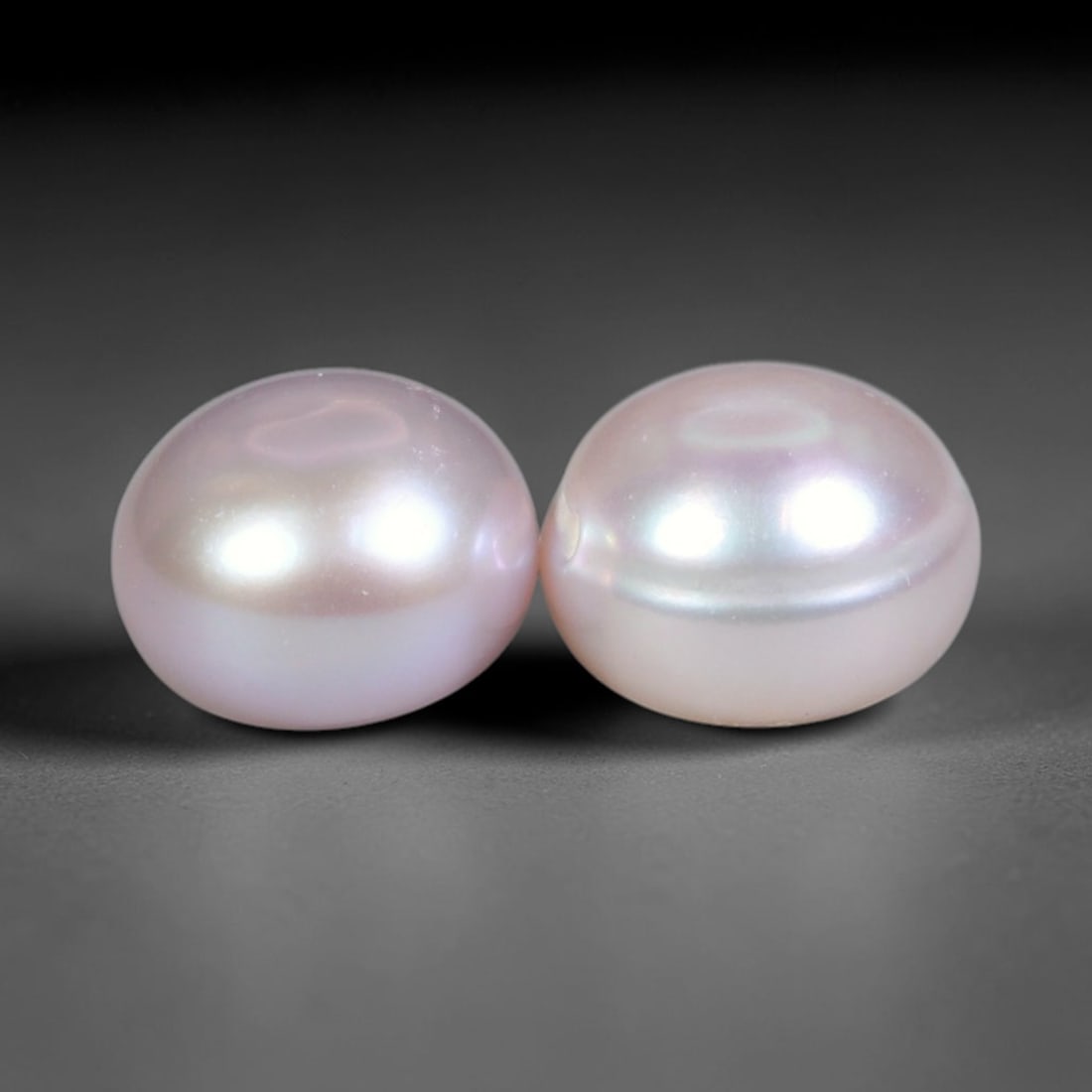 4.95ct Natural Soft Pink Lavender Orient Freshwater Half Round Pearl Pair, 57XZ: Matching pair of natural freshwater half-round pearls, each measuring 7.7x5.6mm, pre-drilled with clean centered holes ready for jewelry mounting. The pearls feature a creamy pale blush base layered w