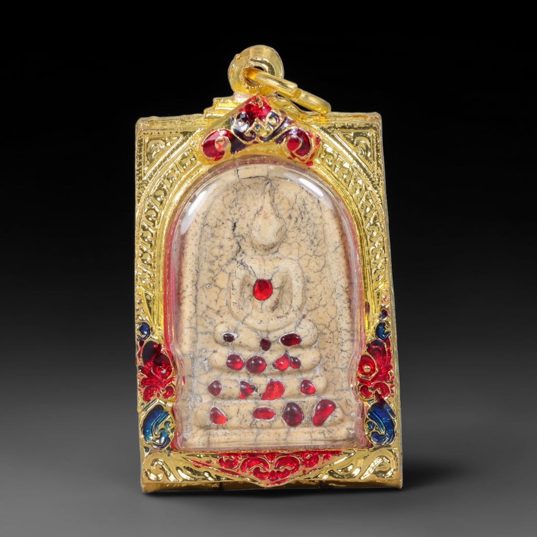 Thai Gilded Clay Metal Amulet Buddhist Votive Pendant, 37ZB: Constructed from fired clay with light gilded finishing layers, the piece uses traditional molded crafting techniques typical of Southeast Asian devotional artifacts. Its rectangular form follows stan