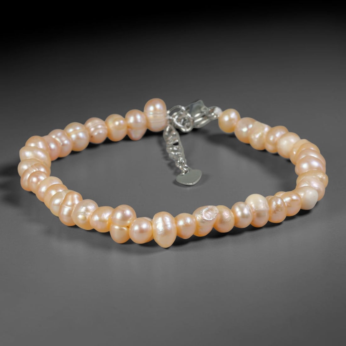 Natural Freshwater Pearl Bracelet - Tiny Baroque Champagne Pearl Strand, 81YM: Handcrafted from miniature organic baroque natural freshwater pearls with soft warm champagne pearlescent luster, each bead bearing delicate uneven rounded shapes characteristic of naturally cultivate