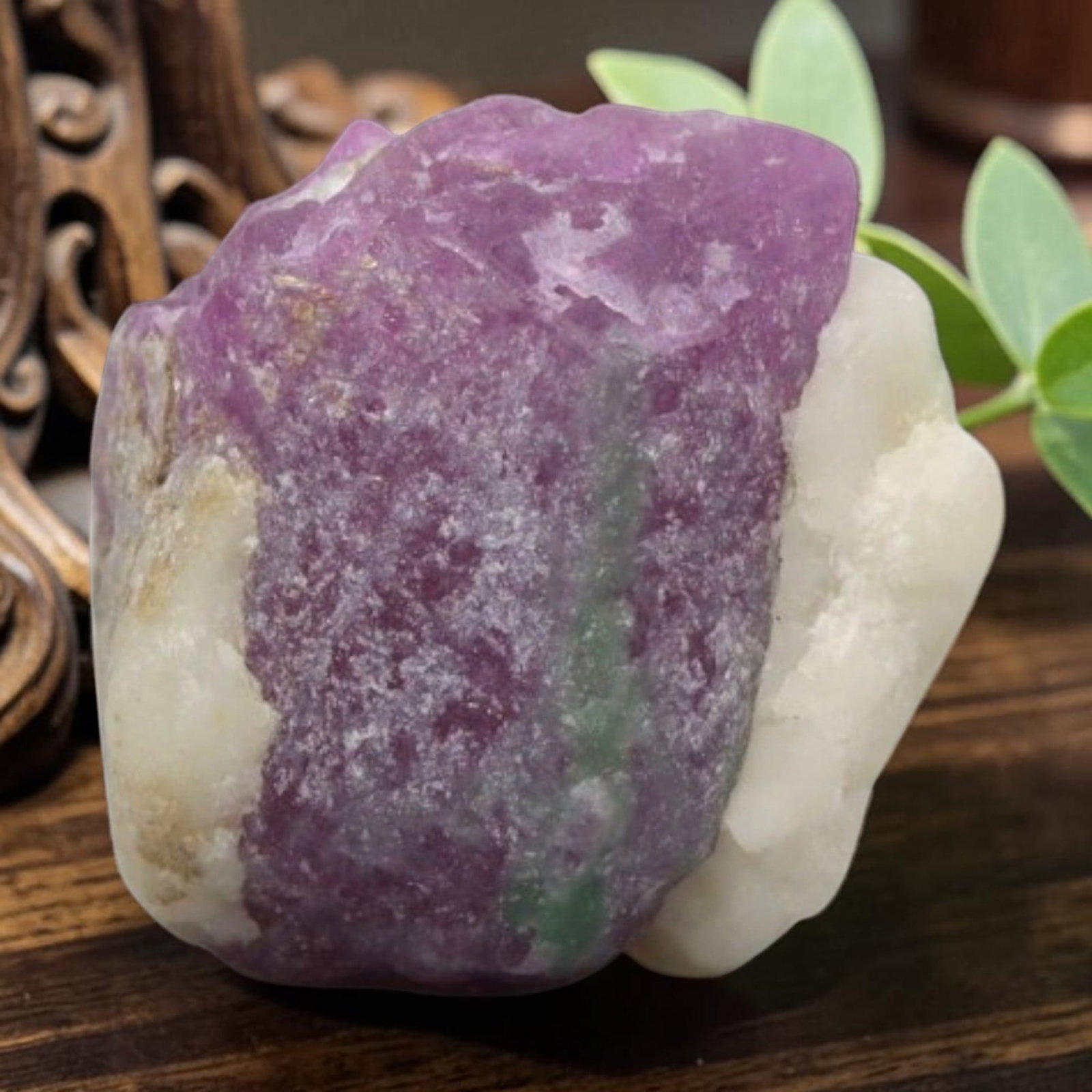 13.24ct Natural Mauritania Ruby Rough (Unheated), 80XE: This unheated Mauritania ruby rough is a captivating natural crystal specimen, featuring vivid magenta-purple ruby formations embedded in a contrasting greyish matrix. The stone's rugged, unpolished s