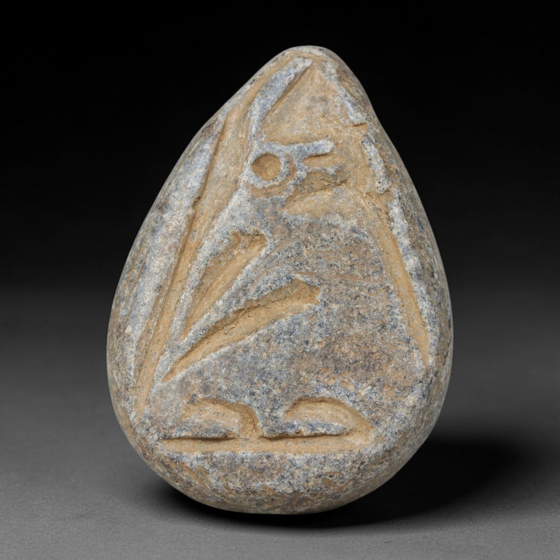 Ancient Near Eastern Hand Carved Schist Protective Amulet, 52WT: Compact antique wearable sacred talisman hand hewn from natural speckled schist metamorphic stone, originating from the broad cultural sphere of the Ancient Near East. Schist was a staple carving mine