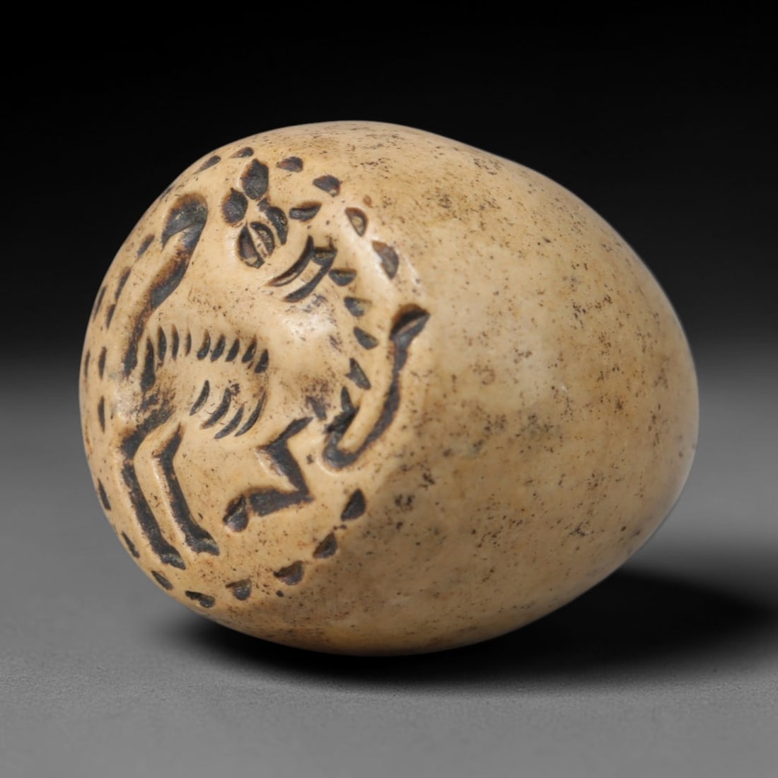 Ancient Sasanian Hand Carved Steatite Stamp Seal Talisman, 23WT: Small antique wearable stamp artifact hand hewn from natural soft steatite stone, originating from ancient Sasanian Persian cultural and administrative craft traditions. Steatite was a widely favored 