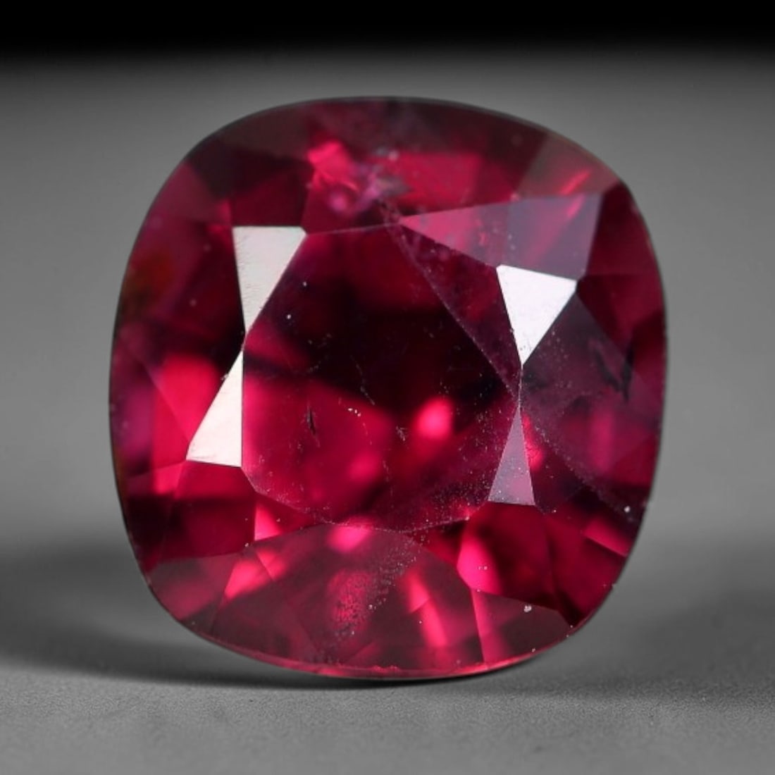 1.80 Carats Natural Rich Wine Red Garnet Cushion Cut Loose Gemstone, 62WS: This soft cushion faceted garnet features a luxurious saturated wine red tone with vibrant scarlet light flashes reflecting off its precisely polished multi-facet surfaces. Fine natural micro mineral 