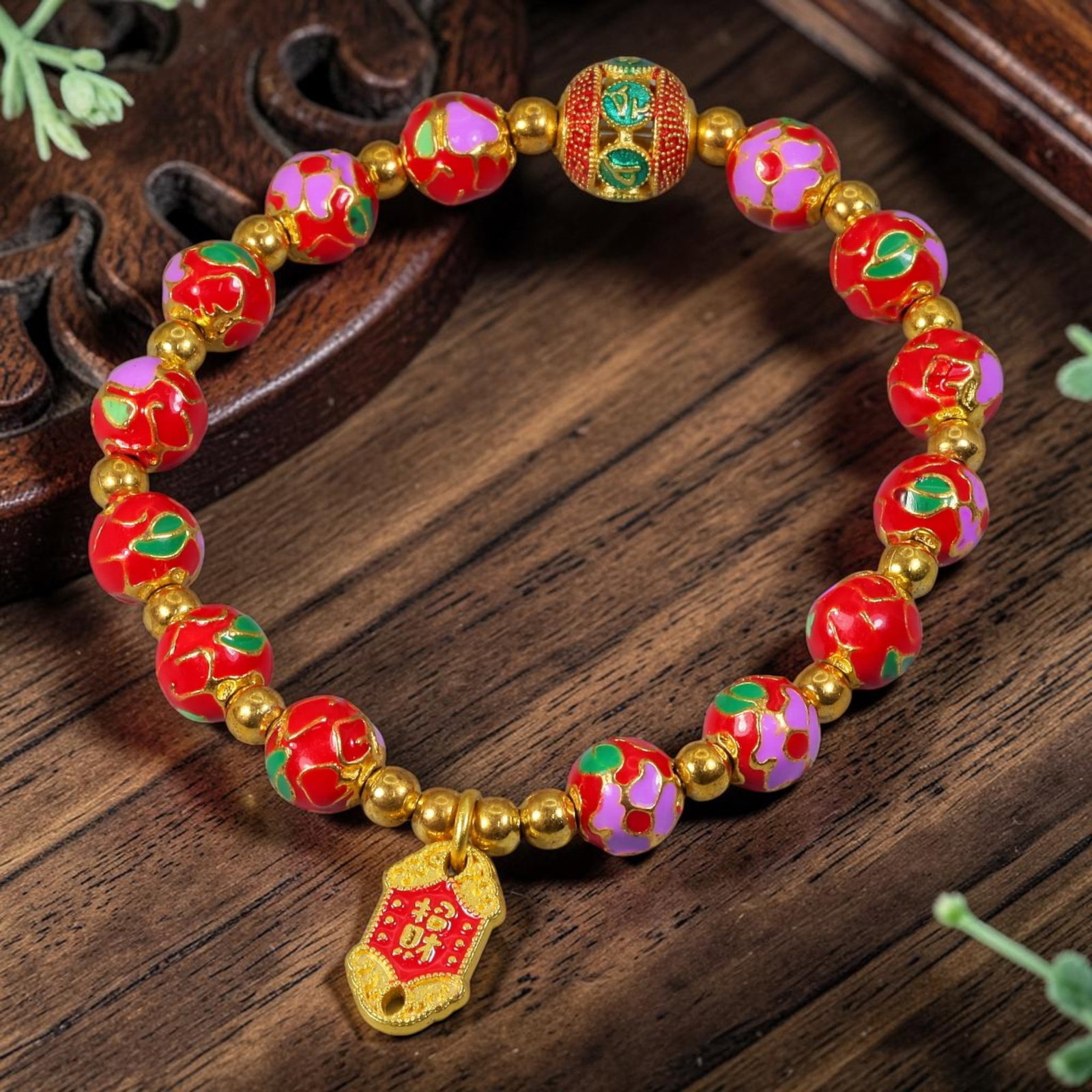 Chinese Cloisonne Enamel Beaded Bracelet - Red Gold Wealth Charm, 82YG: This modern Chinese revival stretch bracelet features 7.80 millimeter round cloisonne enamel beads finished in vibrant scarlet red enamel adorned with hand-painted pink and green floral motifs outline