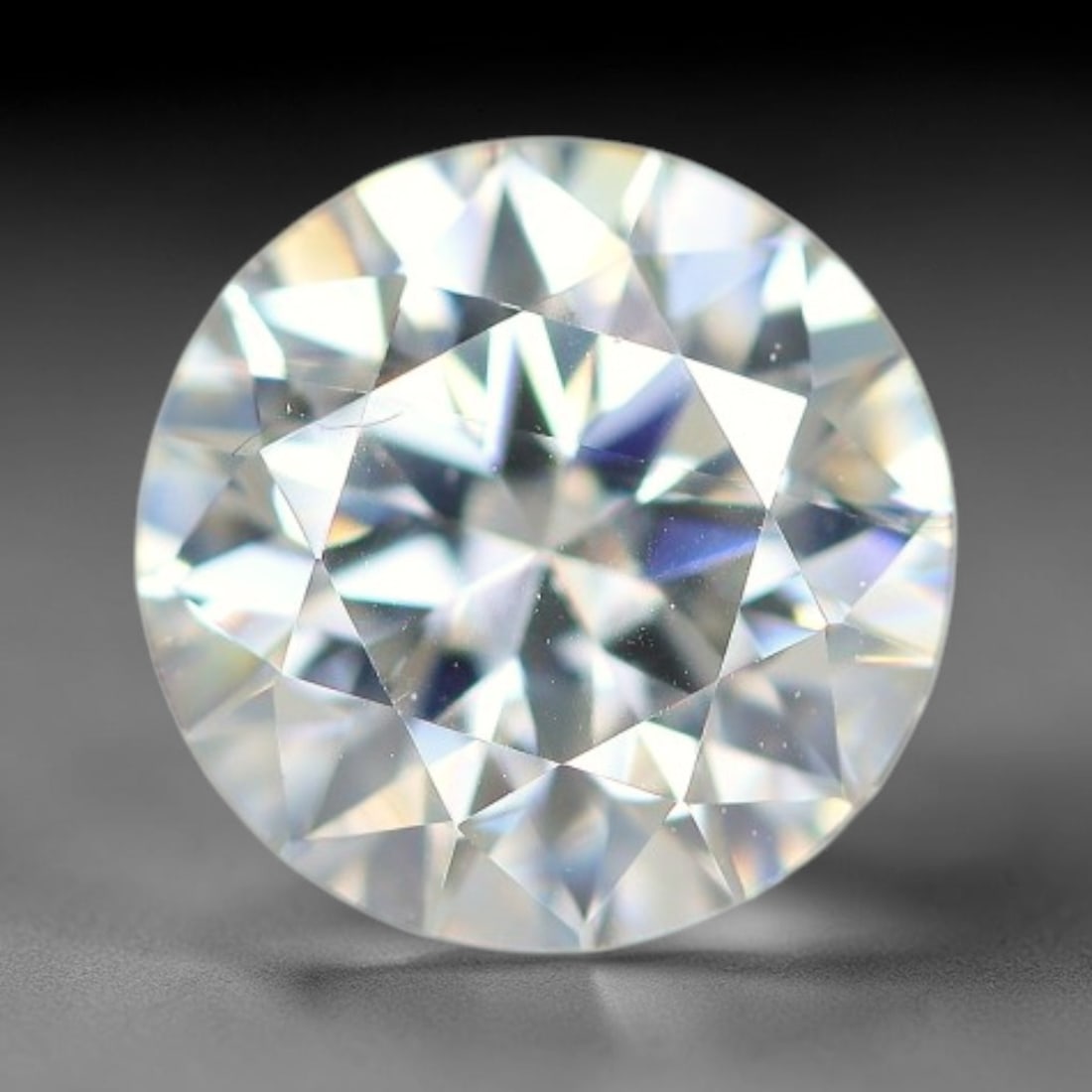 1.22 Carats Clear Moissanite Loose Gemstone, 41WP: This moissanite features dimensions of 7x4.3mm, a lab-created silicon carbide gemstone prized for its exceptional refractive index that generates brilliant light dispersion and consistent sparkle in a