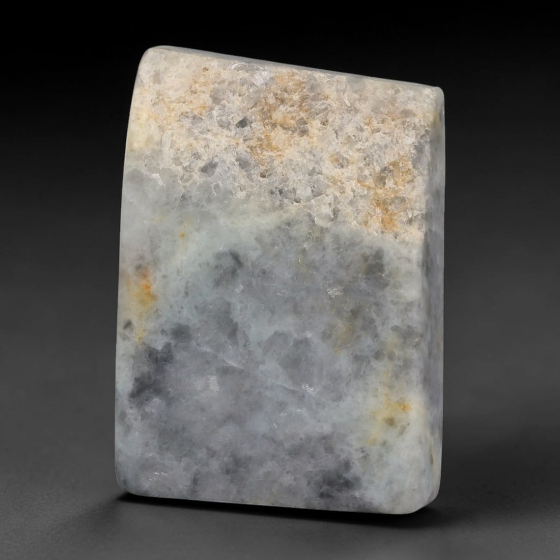 295ct Natural Type A Burmese Jadeite Jade Sliced Rough, 17YR: This specimen is a sliced rough block of natural Type A Burmese jadeite jade. The interior displays natural colour zoning with visible mineral veining and crystalline patterns typical of unprocessed j