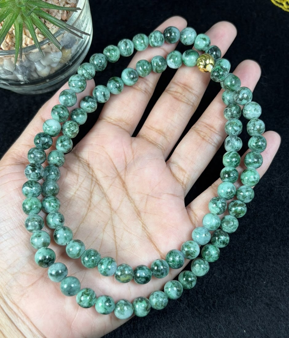 Natural Burmese Type A Grass Green Speckled Jadeite Beaded Necklace, 29YM: Hand-strung natural Burmese Type A jadeite round beads covered with fine scattered grass-green speckles across a pale translucent base, forming classic moss-in-snow texture. Every bead is evenly shape