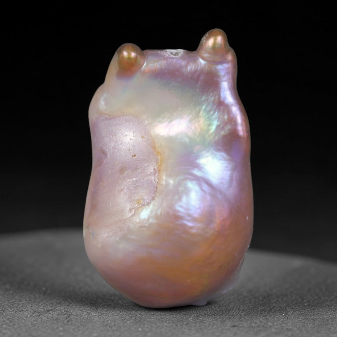Natural Freshwater Keshi Pearl Baroque Loose Pearl, 86WE: This natural freshwater keshi pearl features an organic irregular baroque form with soft iridescent luster shifting across pale lavender, peach and champagne overtones. The nacre surface bears natural