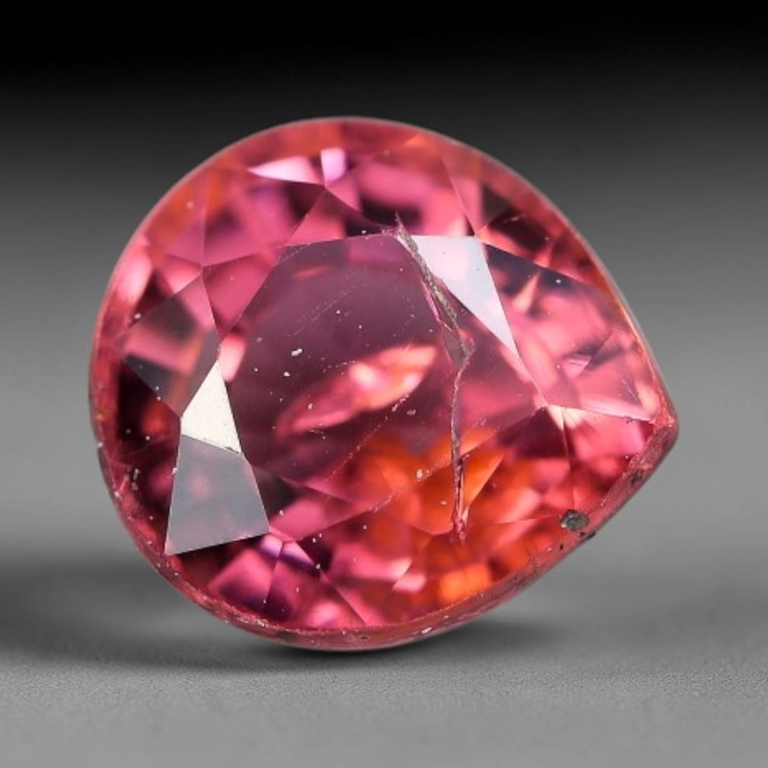 1.22 Carats Natural Bi-Color Pink Orange Pear Tourmaline Faceted Loose Gemstone, 91XV: Natural gradient pink-orange elbaite tourmaline precision cut into a pear-shaped faceted loose gemstone, crafted with mixed brilliant facets to showcase striking dual warm color zoning. The stone disp