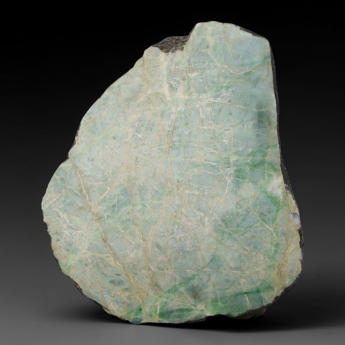 380ct Natural Type A Burmese Jadeite Jade Sliced Rough, 97YN: This specimen is a sliced rough block of natural Type A Burmese jadeite jade. The interior displays natural colour zoning with visible mineral veining and crystalline patterns typical of unprocessed j
