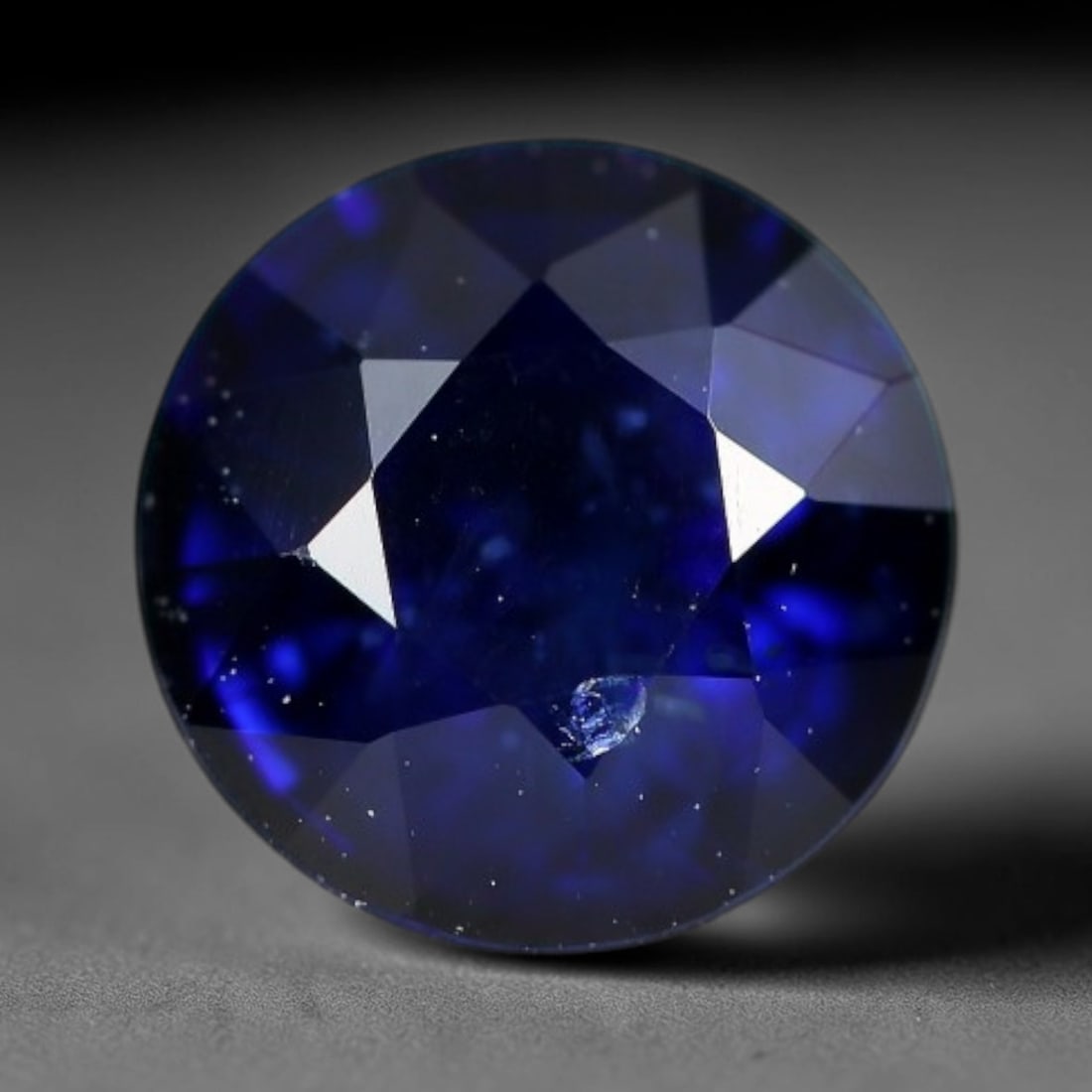 1.28 Carats Natural Madagascar Cobalt Blue Sapphire Loose Gemstone, 64WJ: This cobalt blue sapphire measures 6x4mm, sourced from Madagascar sapphire deposits famous for deep saturated blue sapphire varieties that hold rich consistent color saturation across the crystal stru