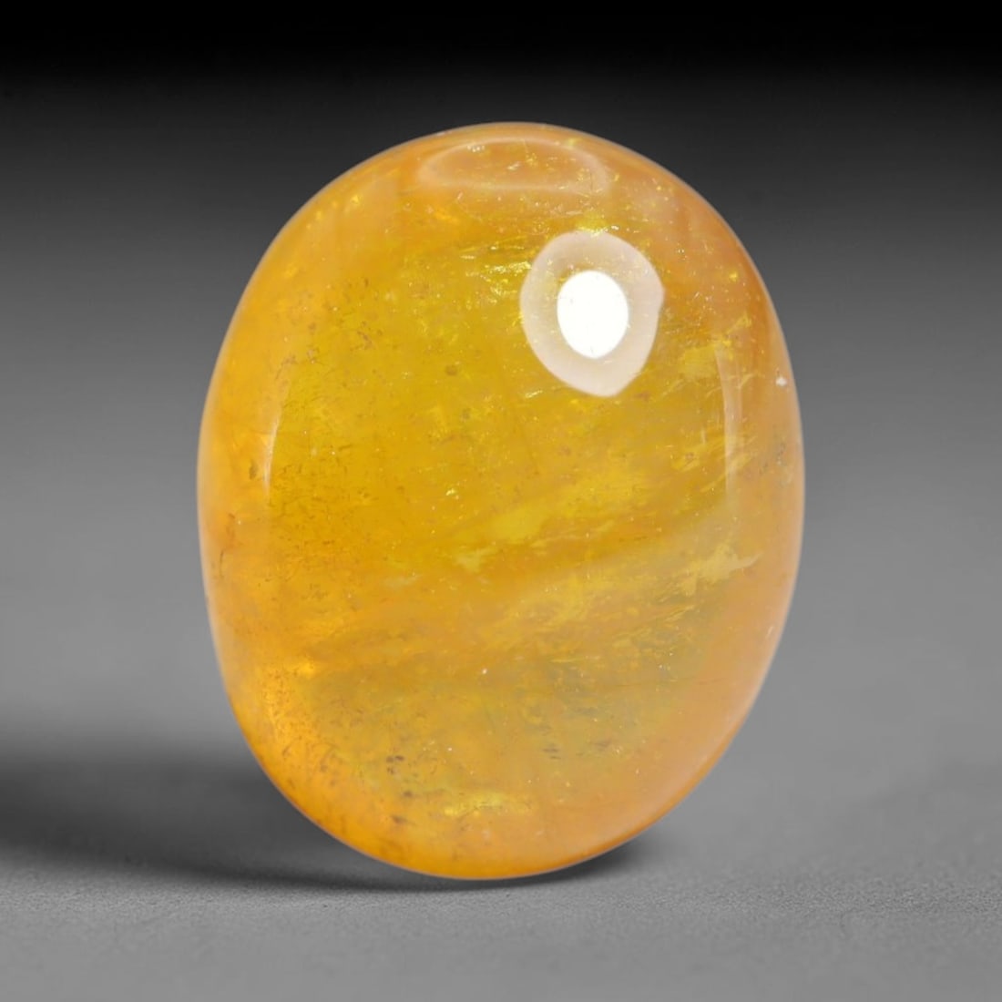 6.86 Carats Natural Madagascar Yellow Sapphire Cabochon Loose Gemstone, 89XY: Formed of natural corundum sourced from Madagascar geological formations, this raw mineral material is shaped and polished into a smooth cabochon form via professional stone processing techniques. Nat