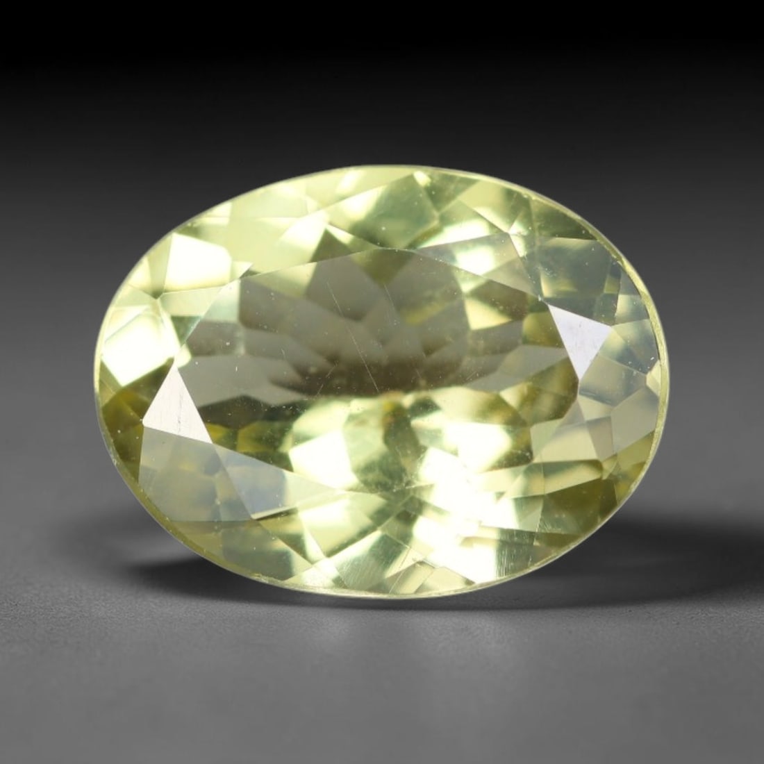 2.98 Carats Natural Pale Yellow Apatite Faceted Loose Gemstone, 53XY: This apatite specimen is sourced from natural geological deposits and shaped with professional faceting and high-gloss polishing work across the outer facet surfaces. Minute internal mineral inclusion