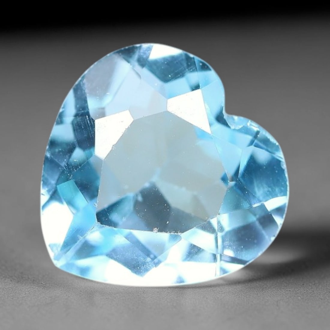 6.81 Carats Natural Brazilian Sky Blue Topaz Heart Faceted Loose Gemstone, 30XY: Constructed from genuine natural topaz sourced from Brazilian mineral deposits, the raw material has been refined through professional faceted lapidary processing with consistent glossy polishing acro