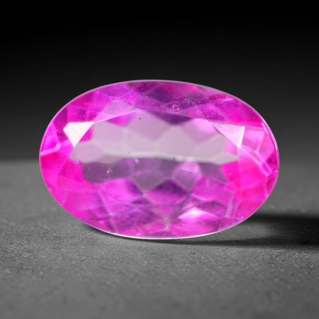 3.34 Carats Natural Brazilian Pink Topaz Oval Faceted Loose Gemstone, 77WY: This specimen is composed of natural topaz sourced from Brazilian mineral deposits, processed via professional faceted lapidary techniques with consistent glossy polishing applied to the entire crysta