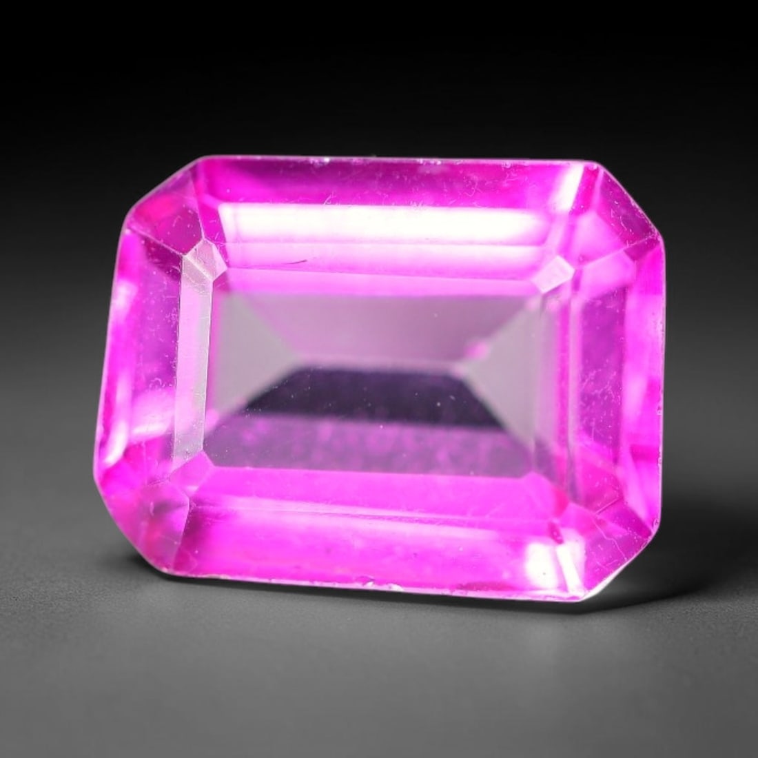 3.25 Carats Natural Brazilian Pink Topaz Octagon Faceted Loose Gemstone, 84WY: This specimen is composed of natural topaz sourced from Brazilian mineral deposits, processed via professional faceted lapidary techniques with consistent glossy polishing applied to the entire crysta