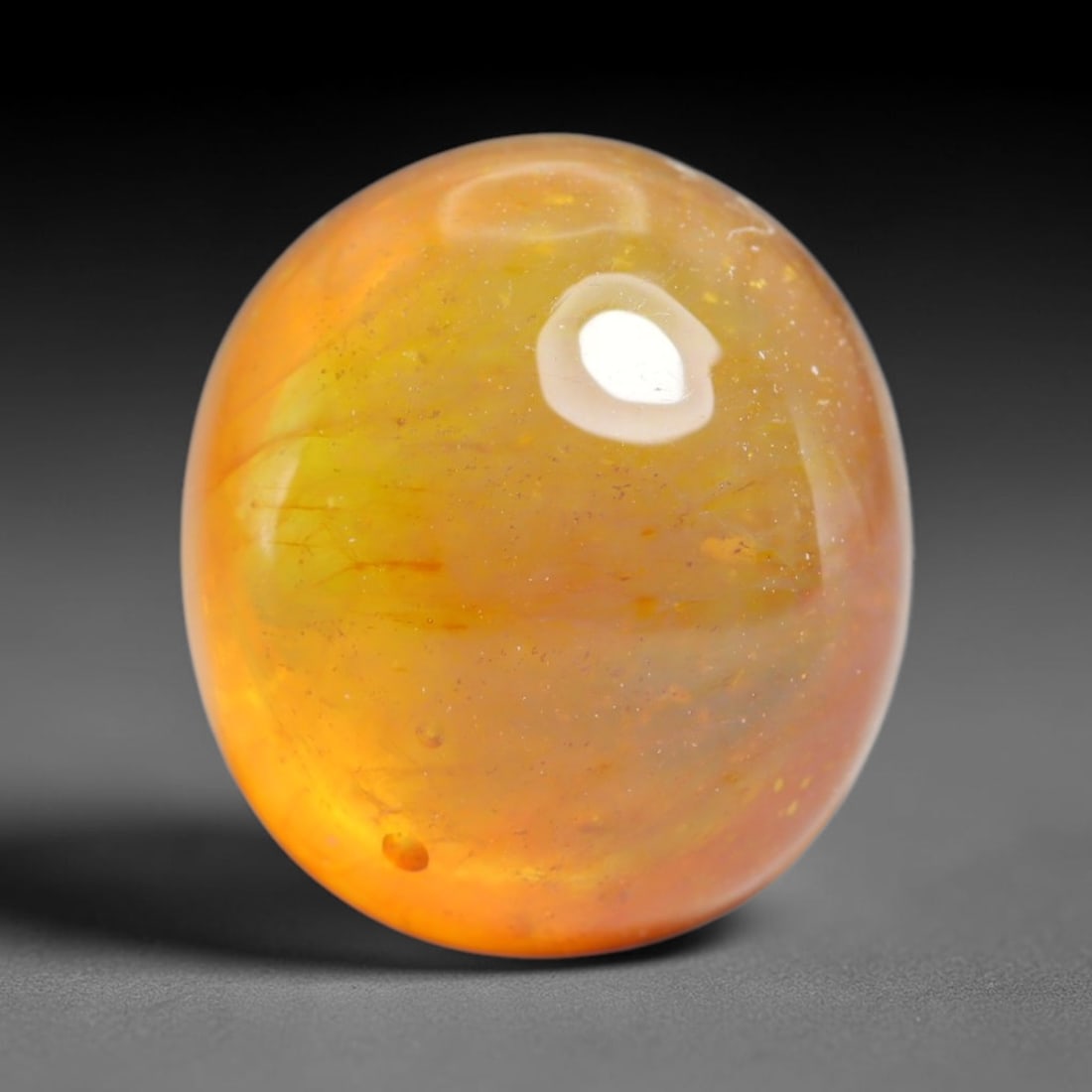 9.48 Carats Natural Madagascar Yellow Sapphire Cabochon Loose Gemstone, 100XY: Formed of natural corundum sourced from Madagascar geological formations, this raw mineral material is shaped and polished into a smooth cabochon form via professional stone processing techniques. Nat
