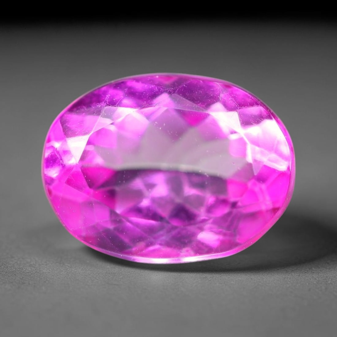 5.17 Carats Natural Brazilian Pink Topaz Oval Faceted Loose Gemstone, 82WY: This specimen is composed of natural topaz sourced from Brazilian mineral deposits, processed via professional faceted lapidary techniques with consistent glossy polishing applied to the entire crysta