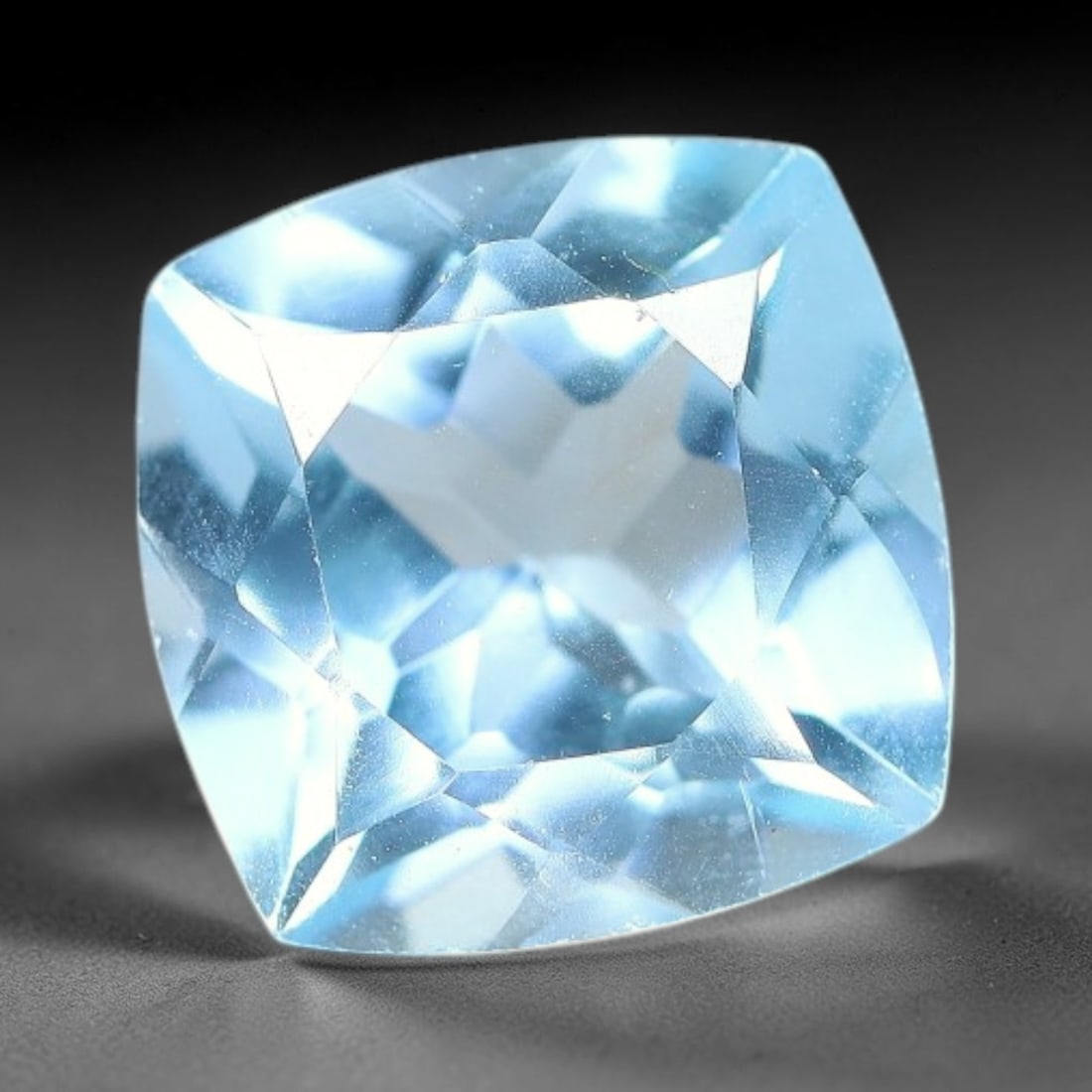 5.74 Carats Natural Brazilian Sky Blue Topaz Cushion Faceted Loose Gemstone, 34XY: Constructed from genuine natural topaz sourced from Brazilian mineral deposits, the raw material has been refined through professional faceted lapidary processing with consistent glossy polishing acro