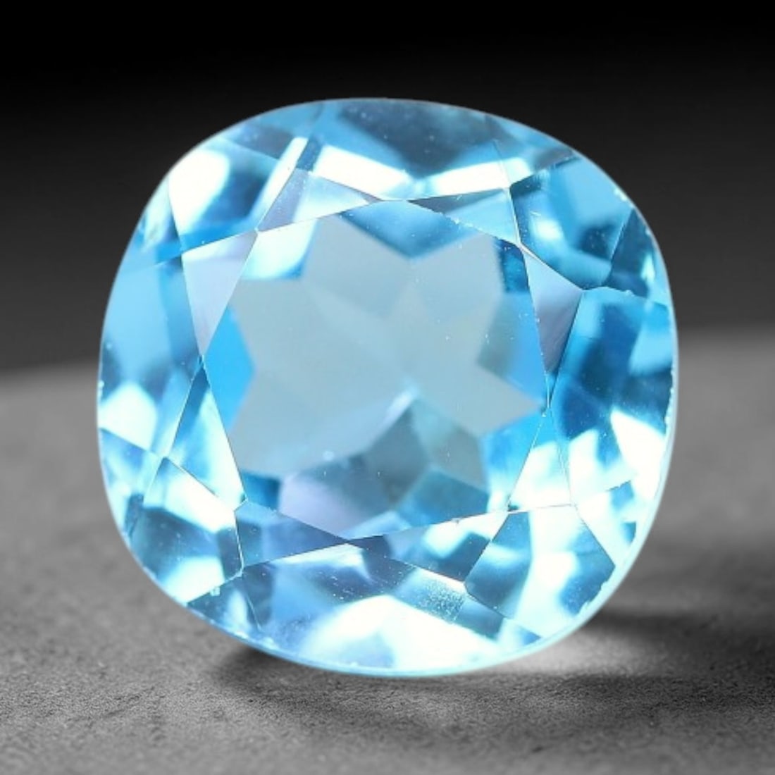 5.77 Carats Natural Brazilian Sky Blue Topaz Cushion Faceted Loose Gemstone, 26XY: Constructed from genuine natural topaz sourced from Brazilian mineral deposits, the raw material has been refined through professional faceted lapidary processing with consistent glossy polishing acro