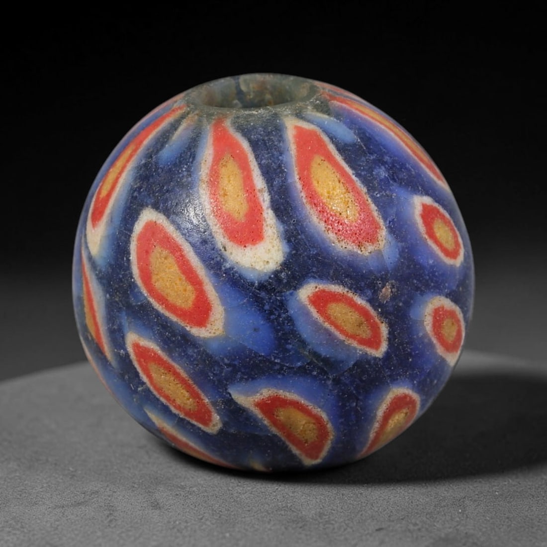 Antique Borneo Glass Trade Bead - 18mm Vintage Handcrafted Bead, 16XD: Antique Borneo glass beads hold deep cultural and historical significance within Southeast Asian maritime trade networks. For centuries, these glass spheres circulated as vital currency, ceremonial ta