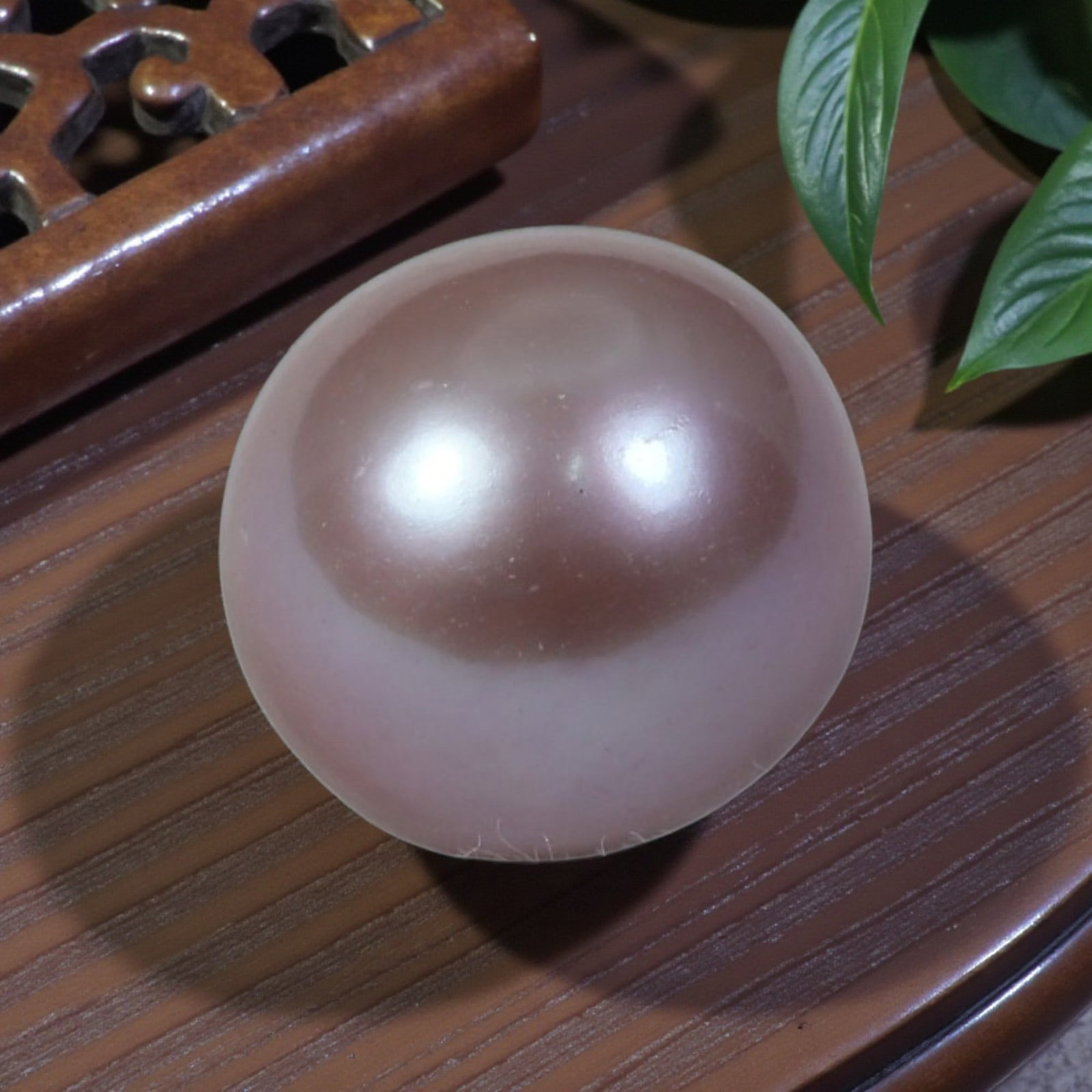 9.82ct Natural Freshwater Pearl - Soft Blush Lavender Sphere 11.2mm, 43YG: This specimen is natural freshwater pearl, polished into a perfectly rounded spherical cabochon featuring soft blush lavender nacre with warm cocoa reflective overtones at the crown. Fine faint surfac