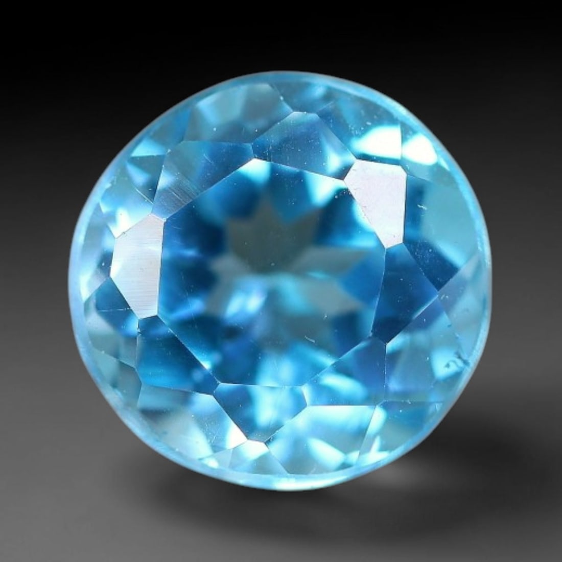 2.85 Carats Natural Swiss Blue Topaz Loose Gemstone, 14WP: This genuine natural swiss blue topaz displays consistent saturated blue coloration inherent to unprocessed natural mineral specimens. Formed through natural geological formation, the stone carries su